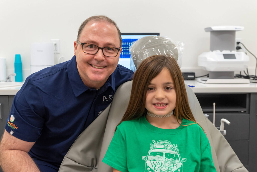Dr. Ritchie & Pediatric Patient at Tyler Pediatric Dentistry